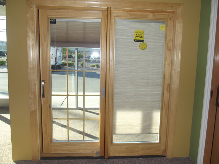 Pella Wood/Clad French Sliding Patio Door with blinds between the glass Master Craftsmen Inc